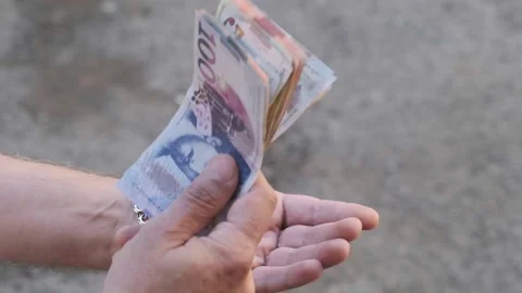 Slow motion. View of men's hands, a man holds Georgian money Stock Footage 219720307