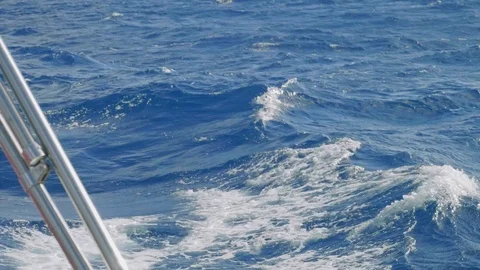 Slow motion view of ocean water over board of yacht Video stock 86986768