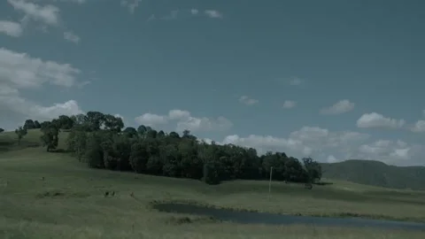 Slow Motion View of Rolling Hills and Pond in Sunshine Coast Hinterland, Queensl Stock Footage 341297967