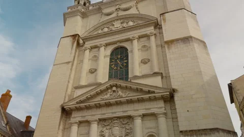 Slow motion view of the Saint Peter Church facade in Saumur Видео 347859457