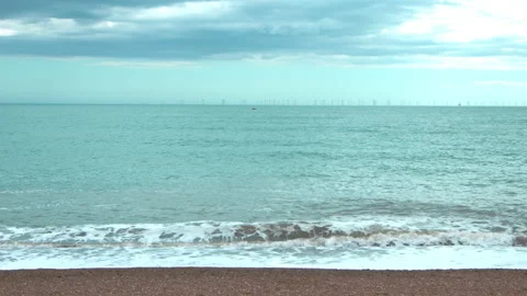 Slow-motion view of sea waves on a cloudy and windy day in 4K. Stock Footage 134634841