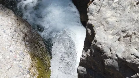 Slow motion view of small waterfall Stock Footage 133270793