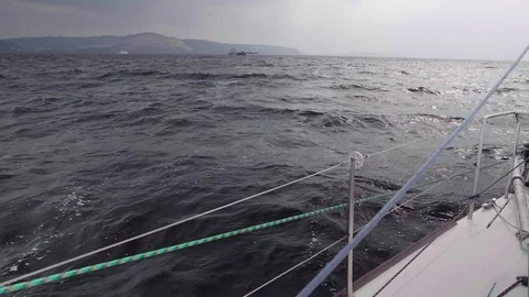 Slow motion view of splash of water. View from yacht sailing yacht board Stock Footage 80220833