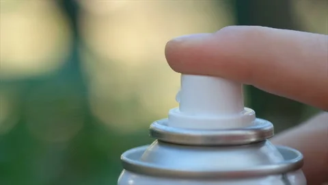 Slow motion view of spray can dispensing chemical air ozone pollutants,pollution Stock Footage 220323831