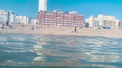 Slow motion view towards brighton beach from the water Stock Footage 139273765