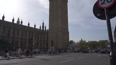 Slow motion view of traffic and pedestrians passing on Westminster Bridge Stock Footage 260022021