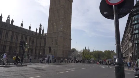 Slow motion view of traffic and pedestrians passing on Westminster Bridge Stock Footage 260022022