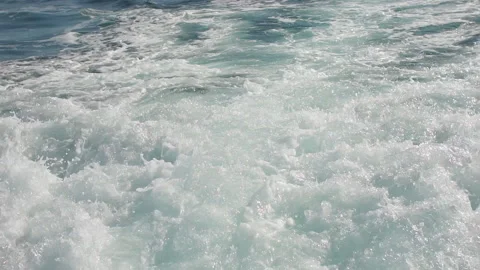 A slow motion view of the wake behind a sports boat at sea. Stock Footage 95723933