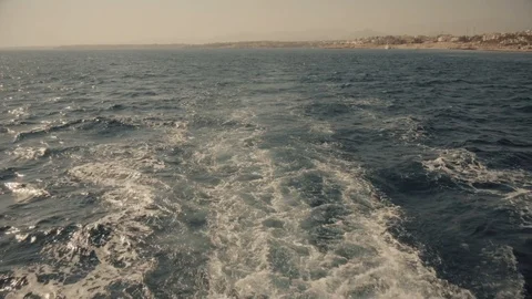 A slow motion view of the wake behind a large cruise ship at sea. Stock Footage 99008973