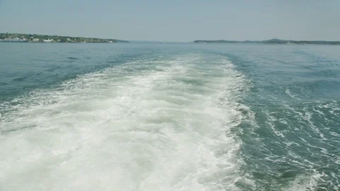 Slow motion view of the wake behind a large boat at sea, 4k Stock Footage 111934085