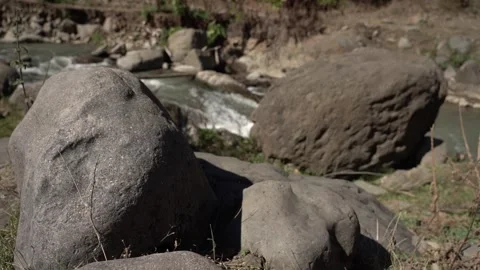 Slow Motion view of Wild Mountain River With Stones and Rocks Stock Footage 255007709