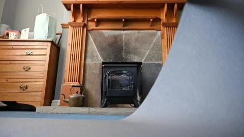 SLOW MOTION view as a yoga mat is lifted from a carpeted living room floor in 스톡 동영상 148339589