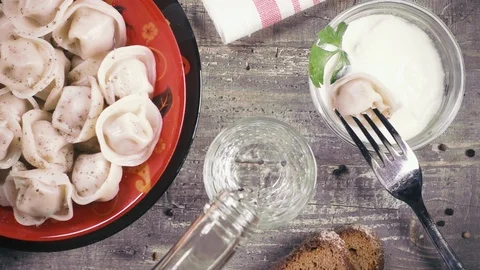 Slow motion vodka and snack according to Russian traditions top view Stock Footage 93103552