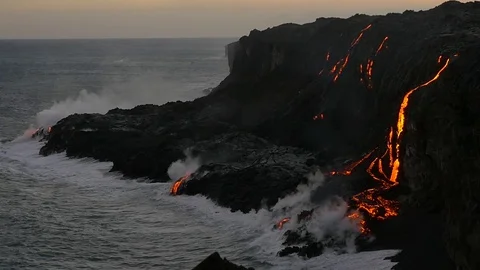 Slow Motion Volcanic Eruption Lava flowing into the water Hawaii Stock Footage 74642138