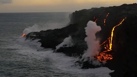 Slow Motion Volcanic Eruption Lava flowing into the water Hawaii Stock Footage 74642170