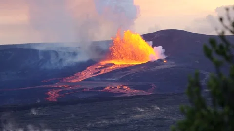 Slow Motion Volcano Eruption with Tree Silhouette Stock Footage 330893389