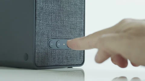 Slow motion volume up button pressing on wireless speaker 4K video 스톡 동영상 171605001