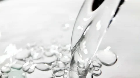 Slow motion vortex water flow with a splashes on white background with matte Stock Footage 123010833