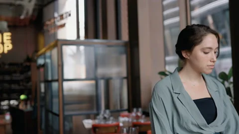 Slow motion of waitress in restaurant Stock Footage 159571708