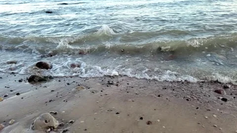 Slow motion walk on the beach with ocean waves 動画素材 332717923