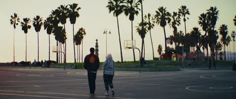 Slow Motion Walk at Venice Beach Basketball Courts Stock Footage 305348495