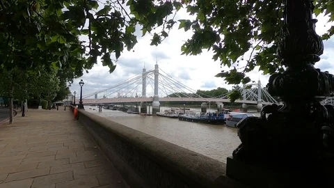 Slow Motion Of Walking To Albert Bridge Through Chelsea Embankment - Vídeos de archivo 111697450