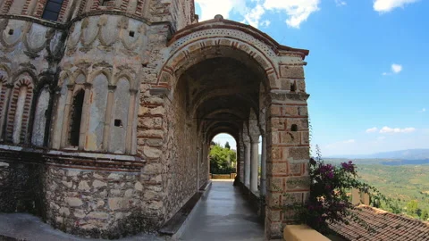 Slow motion walking in byzantine medieval fortified despotate of Mystras on Stock Footage 130647173