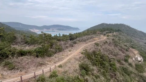 Slow Motion Walking on Chuja Olle Trail Route 18-2 Coastal Path Jeju Korea Vídeo Stock 332372626