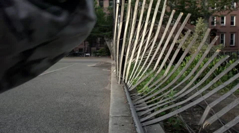 Slow motion of walking by a fallen fence Video stock 40361982