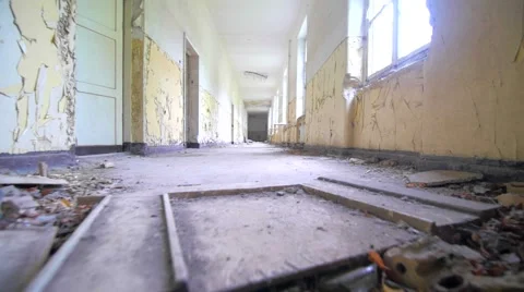 Slow motion walking through a cracked abandoned building 스톡 동영상 58615362