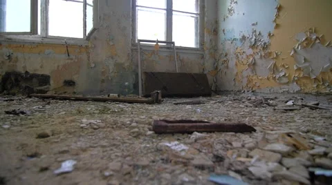 Slow motion walking through a cracked abandoned building 스톡 동영상 58615492