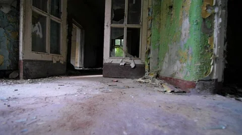 Slow motion walking through a cracked abandoned building 스톡 동영상 58615626