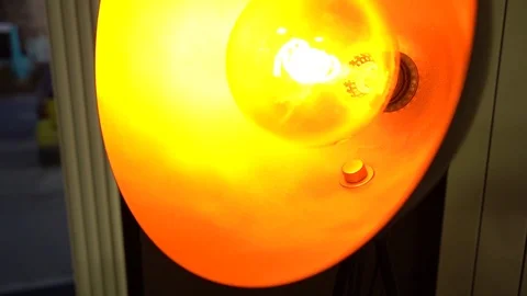 Slow motion warm light transition, fashion light lamp take 1 close up 库存影片 123001279