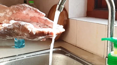Slow motion of washing hands with soap to clean from corona virus or covid-19. Video stock 130285688