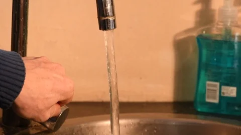 Slow motion washing hands under tap Stock Footage 100824622
