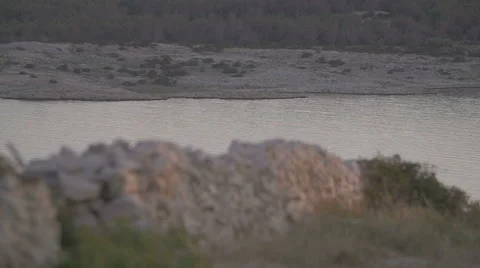 Slow motion of water and rocks, landscape shot at summer Stock Footage 54218173