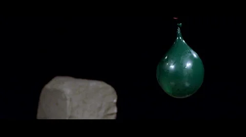Slow Motion Water Balloon Stabbed and Burst Video stock 42741787