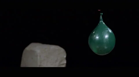 Slow Motion Water Balloon Stabbed and Burst Video stock 42775288