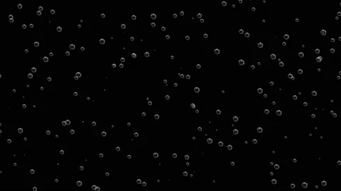 Slow motion water bubbles. On a black surface. Water background on black. Stock Footage 113668603
