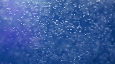 Slow motion of water bubbles in purple and blue colors Video stock 234505000