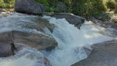 Slow Motion of Water Cascading Over Granite Rocks Stock Footage 314862891