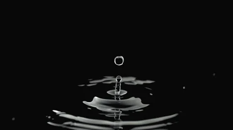 Slow motion water drip, black background | Stock Video | Pond5