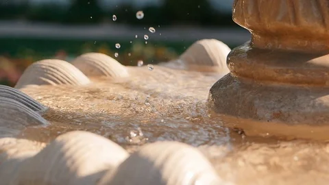 Slow motion of water dropping in stone fountain Stock-Footage 102674459