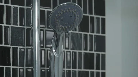 Slow motion of Water drops in the shower head Stock Footage 76596609