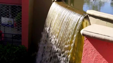 Slow motion of water falling in an artificial waterfall in Tangua Park, Curitiba Stock Footage 276575456