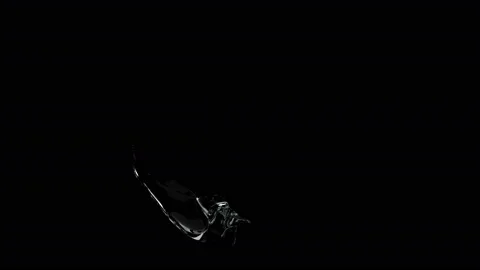 Slow motion of the water flow and forming it into a circle on a black background Stock Footage 136038601