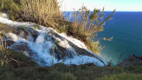 Slow Motion Water Flow at Düden Waterfall Cliff in Antalya Vídeos de archivo 333445524
