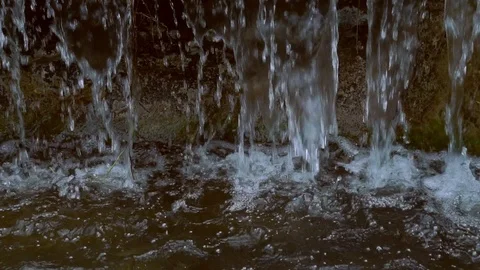 Slow motion water flow on stone 動画素材 108470839