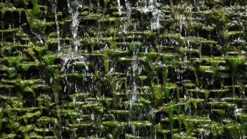 Slow motion water flow on stone Stock Footage 108470895