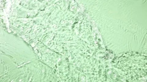 Slow Motion Water Flowing Over Light Green Surface Stock Footage 341926424